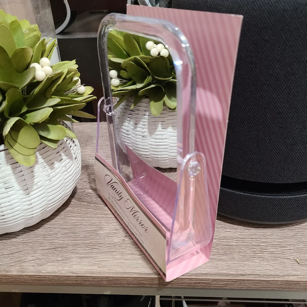 Rectangular vanity mirror with clear frame